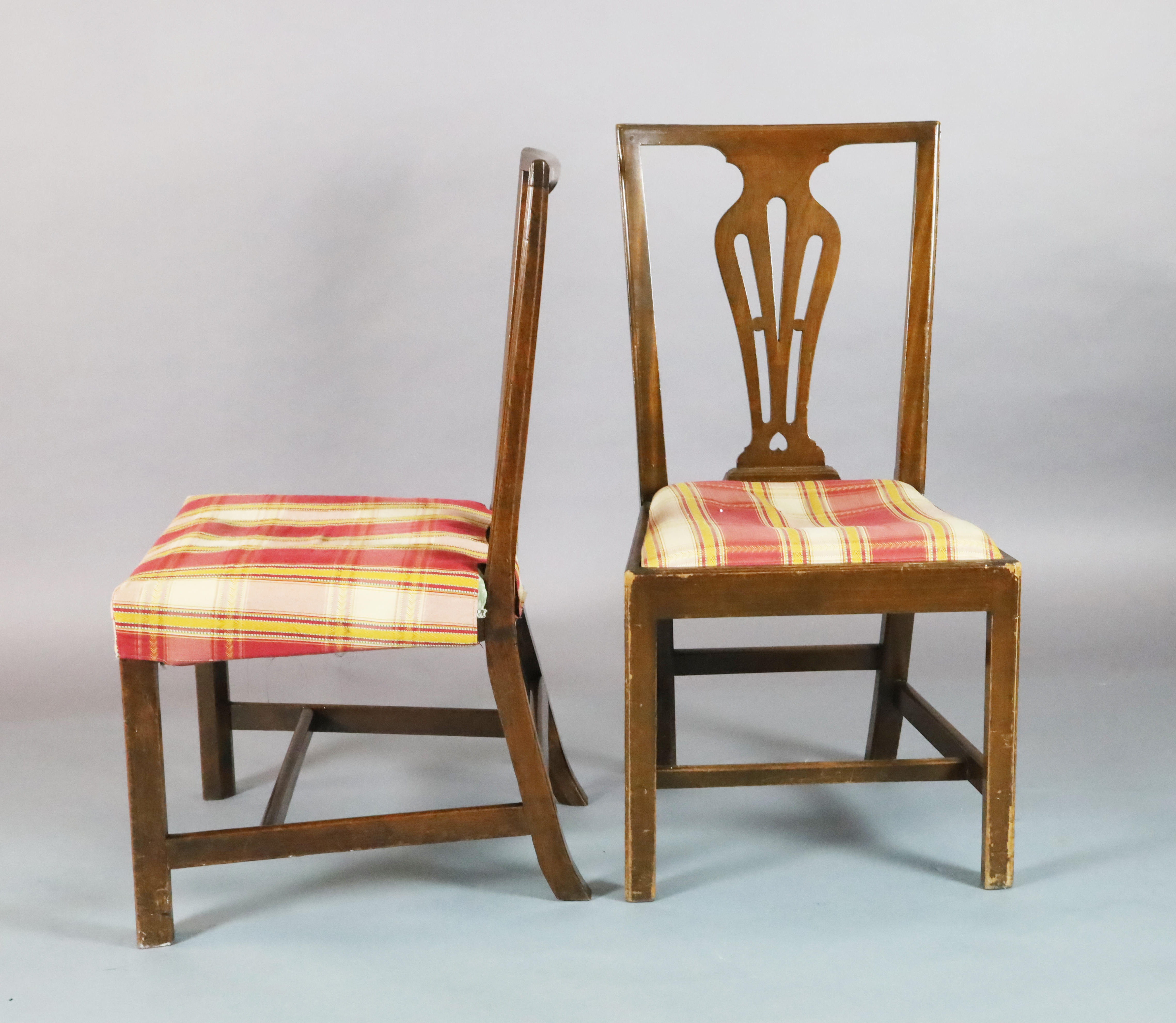 A harlequin set of ten George III and later provincial mahogany and fruitwood dining chairs
